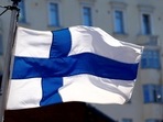 FILE PHOTO: Finland's flag flutters in Helsinki, Finland, May 3, 2017. REUTERS/Ints Kalnins/File Photo