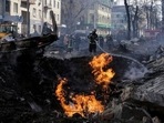 Firefighters extinguish a fire after a Russian rocket attack in Kharkiv, Ukraine's second-largest city, Monday, March 14, 2022. (AP Photo/Pavel Dorogoy, File)(AP) Firefighters extinguish a fire after a Russian rocket attack in Kharkiv, Ukraine's second-largest city, Monday, March 14, 2022. (AP Photo/Pavel Dorogoy, File)(AP)