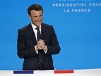 France's President Emmanuel Macron, and French liberal party La Republique en Marche (LREM) candidate to his succession reacts during a press conference to present his political programme ahead of the April 10/24 presidential election in France, in the Paris' suburban city of Aubervilliers, on March 17, 2022. (Photo by Ludovic MARIN / AFP) France's President Emmanuel Macron, and French liberal party La Republique en Marche (LREM) candidate to his succession reacts during a press conference to present his political programme ahead of the April 10/24 presidential election in France, in the Paris' suburban city of Aubervilliers, on March 17, 2022. (Photo by Ludovic MARIN / AFP)
