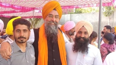 Aam Aadmi Party MLA Kultar Sandhwan with supporters after retaining the Kotkapura assembly segment in Faridkot district, on March 10. (HT Photo)