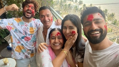 Katrina Kaif poses with husband Vicky Kaushal and his family. Katrina Kaif poses with husband Vicky Kaushal and his family.