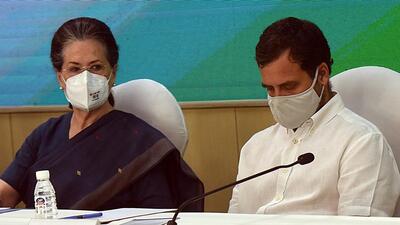 Interim Congress president Sonia Gandhi with her son Rahul Gandhi during the CWC meeting in New Delhi on March 13. (HT Photo) Interim Congress president Sonia Gandhi with her son Rahul Gandhi during the CWC meeting in New Delhi on March 13. (HT Photo)