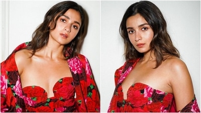 Alia Bhatt displays floral magic on Holi in ₹3 lakh strapless red mini dress and oversized jacket: See pics, video Alia Bhatt displays floral magic on Holi in ₹3 lakh strapless red mini dress and oversized jacket: See pics, video