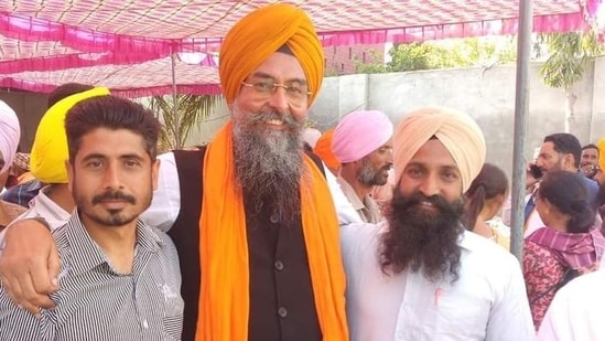 Aam Aadmi Party MLA Kultar Sandhwan with supporters after retaining the Kotkapura assembly segment in Faridkot district, on March 10. (HT Photo)