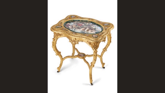 A porcelain-mounted gilt table from Austria, auctioned by AstaGuru. Furniture is one of the new, growing categories in the collectibles space, with numerous Indian auction houses now viewing it as a distinct segment.