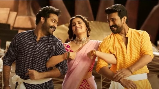 Alia Bhatt, Ram Charan and Jr NTR in a still from RRR's new song Sholay.
