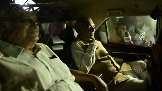 Congress leaders Bhupinder Singh Hooda and Kuldeep Sharma leave from the residence of party leader Ghulam Nabi Azad, after the Congress G-23 leaders' meeting , in New Delhi, Wednesday, March 16, 2022. (PTI Photo/Ravi Choudhary)
