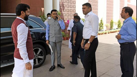 Goa caretaker-CM Pramod Sawant with Bharatiya Janata Party (BJP) national general secretary C T Ravi at the party headquarters, in New Delhi. (ANI PHOTO.)