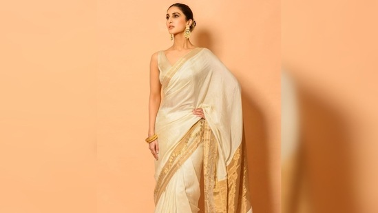 Vaani Kapoor opted for the soft glam makeup look with little dramatic eyes and went for the middle-parted low back bun.(Instagram/@_vaanikapoor_)