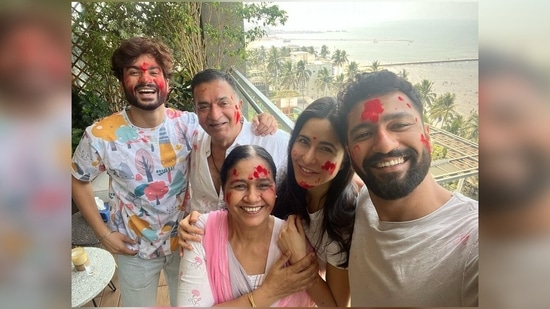 Katrina Kaif and Vicky Kaushal are celebrating their first Holi together after their marriage. The couple took to their Instagram handles to share the same picture with Vicky's parents and his brother Sunny Kaushal.(Instagram/@katrinakaif)