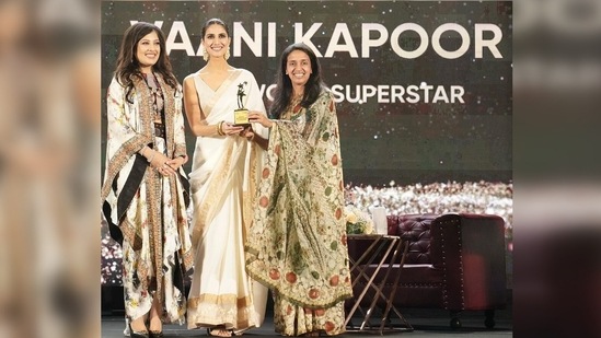 Vaani Kapoor shared a photo from her event while receiving the award and captioned her post, "Honoured to receive the ‘Best Actor in a Leading Role’ award for #ChandigarhKareAashiqui at the FICCI Achievers Awards 2021-2022! Thank you for the love!"(Instagram/@_vaanikapoor_ Verified)