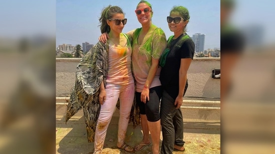 In another photo, Soha Ali Khan was seen striking a pose with Neha Dhupia and her friends while Neha's husband Angad Bedi photobombs with their daughter.(Instagram/@sakpataudi)