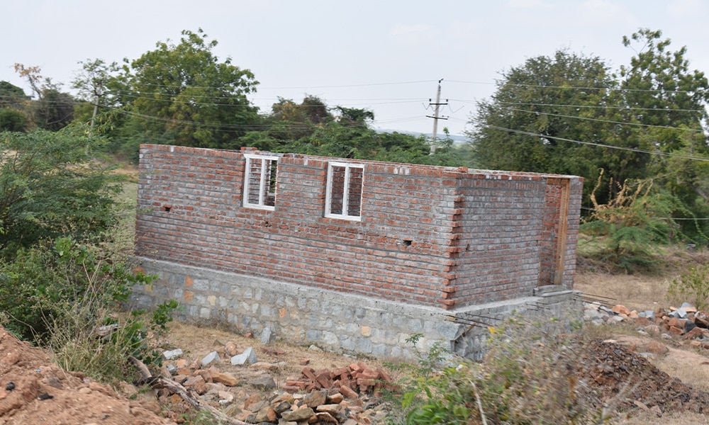 A half-way constructed house has been abandoned