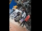 Man stabs himself while dancing during Holika Dahan ritual.