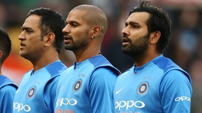MS Dhoni (L), Shikhar Dhawan (centre) and Rohit Sharma (Getty Images)
