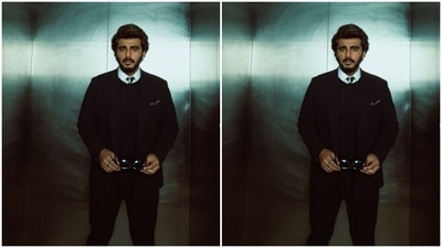 Arjun paired a white shirt with a black sweater and a black suit. He added black fit trousers to his look and aced it to perfection. (Instagram/@arjunkapoor)