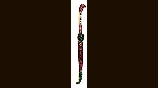 A 17th-century fruit knife with a jade hilt, inlaid with precious stones, crafted to resemble the head of a parrot perched on gold leaves. The knife is said to have belonged to Mughal empress Nur Jahan, wife of the fourth Mughal emperor Jahangir. (Image courtesy Salar Jung Museum)