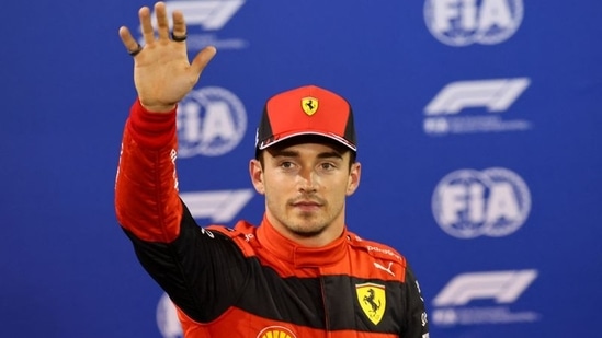 Ferrari's Charles Leclerc celebrates pole position after qualifying.(Pool via REUTERS)