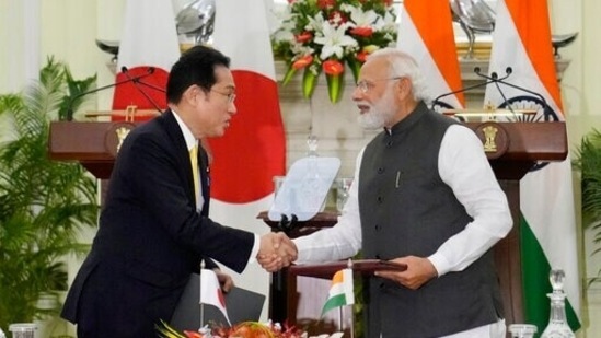 Prime Minister Narendra Modi shakes hand with his Japanese counterpart Fumio Kishida during a signing of agreements in New Delhi, Saturday(AP) Prime Minister Narendra Modi shakes hand with his Japanese counterpart Fumio Kishida during a signing of agreements in New Delhi, Saturday(AP)