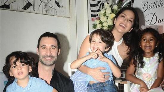 Actor Sunny Leone with husband Daniel Webber and their three children.