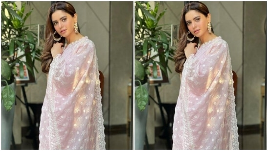 Aamna paired a georgette chikankari kurta with a pair of cotton pastel pink trousers. She completed her look with a pastel pink dupatta intricately embroidered in white resham threads.(Instagram/@aamnasharifofficial)