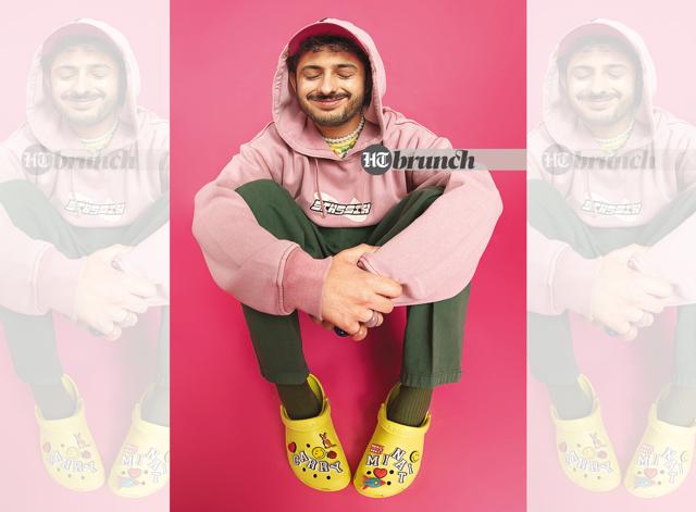 Ajey is known for celebrity roasts and marathon gaming streaming sessions, and has recently forayed into music and short-form videos, including one that’s a satirical take on cancel culture; Hoodie by Six5Six; Cap by H&M; Pants by Benetton; T-shirt by Adidas Originals; Slides by Crocs; Accessories by Zara (Shivamm Paathak) Ajey is known for celebrity roasts and marathon gaming streaming sessions, and has recently forayed into music and short-form videos, including one that’s a satirical take on cancel culture; Hoodie by Six5Six; Cap by H&M; Pants by Benetton; T-shirt by Adidas Originals; Slides by Crocs; Accessories by Zara (Shivamm Paathak)