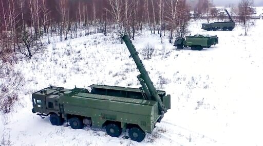 In this photo taken from video provided by the Russian Defense Ministry Press Service on Tuesday, Jan. 25, 2022, The Russian army's Iskander missile launchers take positions during drills in Russia. (AP)