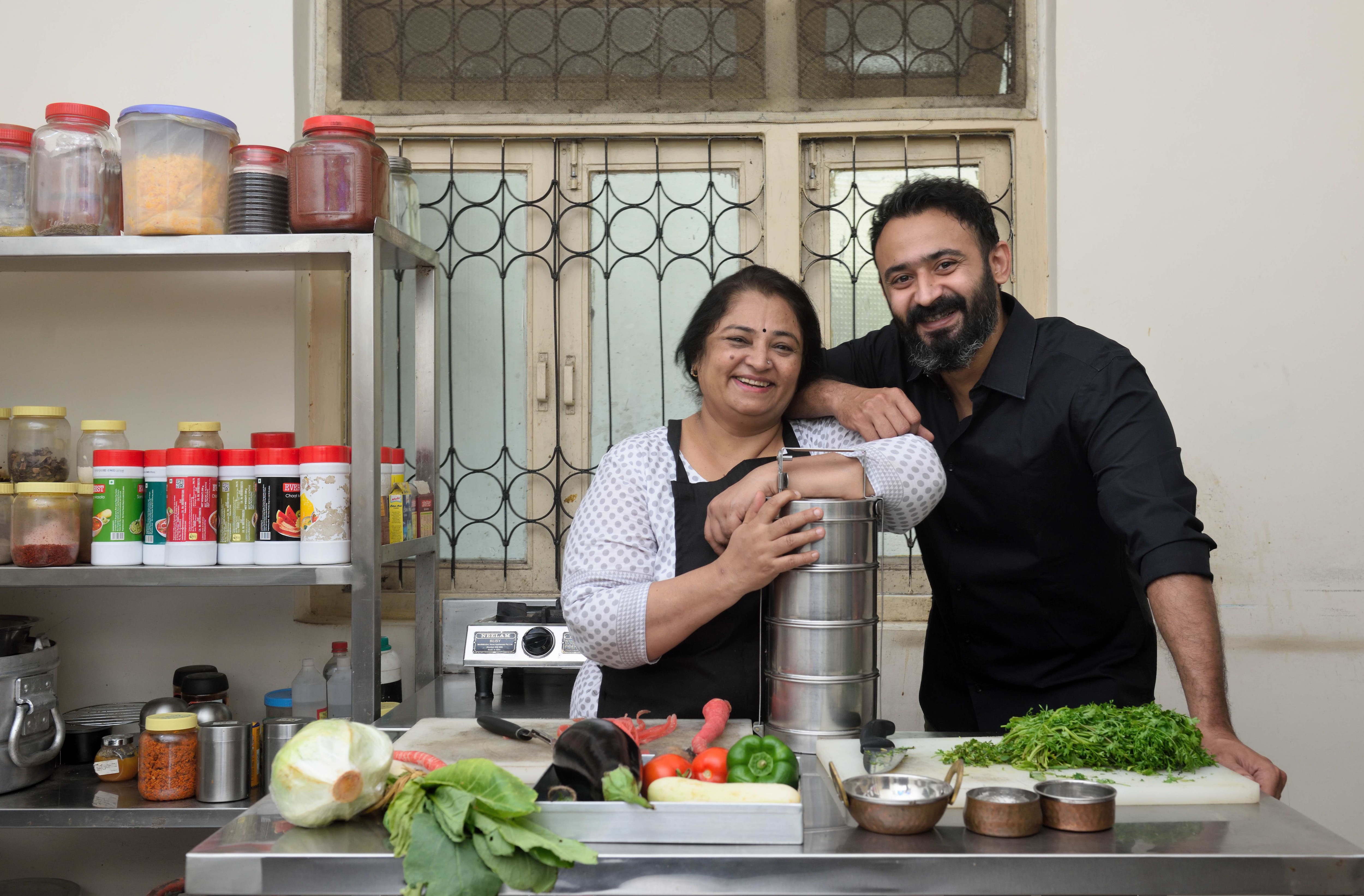 Harsh and his mother Taruna Mav turned their tiffin business into a free-meals mission, delivering to those left stranded in the first shutdowns. Since then, plans have changed, new ones have been born, but free meals are part of each one. (Satish Bate / HT Photo) Harsh and his mother Taruna Mav turned their tiffin business into a free-meals mission, delivering to those left stranded in the first shutdowns. Since then, plans have changed, new ones have been born, but free meals are part of each one. (Satish Bate / HT Photo)