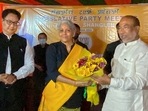 Union Minister Nirmala Sitharaman presents a bouquet to BJP leader N Biren Singh in Imphal after his election as CM of Manipur. (PTI photo) Union Minister Nirmala Sitharaman presents a bouquet to BJP leader N Biren Singh in Imphal after his election as CM of Manipur. (PTI photo)