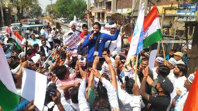 AAP’s former Haryana convener Naveen Jaihind during a protest at CM Khattar’s Karnal residence on Sunday. (HT Photo)