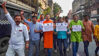 BJP activists during a protest march against the alleged attack on BJP MP Jagannath Sarkar in Kolkata on Sunday. (PTI PHOTO.)