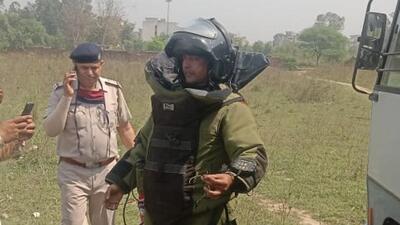 Member of a bomb disposal squad at the site where the hand grenades and IED were recovered in Ambala on Sunday. (HT Photo)