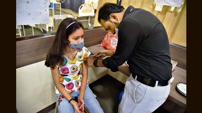 A beneficiary getting the vaccine at Kamala Nehru hospital, Mangalwar peth, on Saturday (HT PHOTO) A beneficiary getting the vaccine at Kamala Nehru hospital, Mangalwar peth, on Saturday (HT PHOTO)
