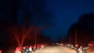 Locals give a tribute to ‘a fallen hero’ in Ukraine. (Twitter/MFA_Ukraine)