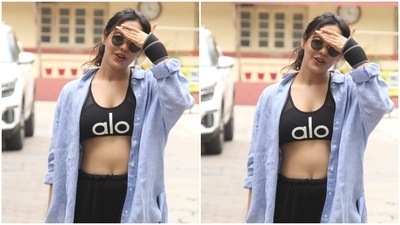 Neha gave sassier vibe to her gym look with a blue oversized shirt. (HT Photos/Varinder Chawla)