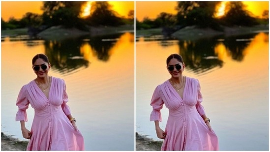 Mrunal played muse to the fashion designer house Bunaai and picked a pastel pink gown for the outdoor photoshoot.(Instagram/@mrunalthakur)