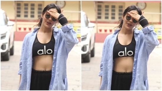 Neha gave sassier vibe to her gym look with a blue oversized shirt.(HT Photos/Varinder Chawla)