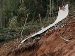 Debris of a Chinese passenger plane that was carrying 132 people when it crashed in China's Guangxi province on Monday. (Credit: @CGTNOfficial)