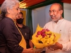 Nirmala Sitharaman presents a bouquet to BJP leader N. Biren Singh after his election as the leader of BJP Manipur Pradesh legislative party & Chief Minister of Manipur, (PTI) Nirmala Sitharaman presents a bouquet to BJP leader N. Biren Singh after his election as the leader of BJP Manipur Pradesh legislative party & Chief Minister of Manipur, (PTI)