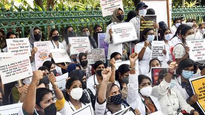 Students pursuing medical education in Ukraine and China during a protest organised by Foreign Medical Graduates Parents Association, seeking government intervention for continuing their interrupted studies, in front of the Kerala Secretariat, in Thiruvananthapuram on Saturday. (PTI)