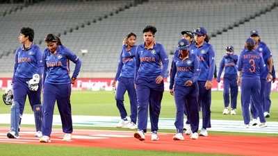 Indian players walk back from the field after their defeat by 6 wickets against Australia Indian players walk back from the field after their defeat by 6 wickets against Australia