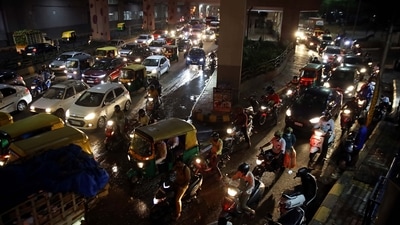 Bengaluru: Vehicles stuck in the traffic jam on the Mysore road after heavy rain in Bengaluru, Saturday, March 19, 2022. (PTI Photo)(PTI03_19_2022_000168B) (PTI)