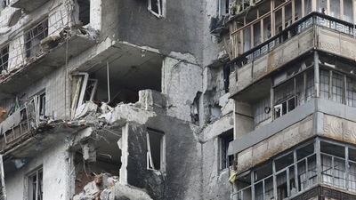 A view shows a residential building that was damaged during the Ukraine-Russia conflict in Mariupol. (REUTERS)