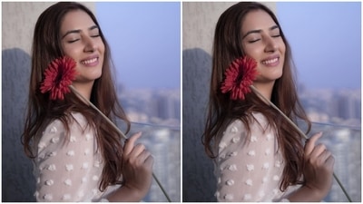 Disha's ensemble features a one-shoulder neckline with a full sleeve. It comes adorned with embroidered patterns, billowy sleeve with a gathered cuff, cinched waistline featuring a lace border, and a thigh-high slit on the side. (Instagram/@dishaparmar) Disha's ensemble features a one-shoulder neckline with a full sleeve. It comes adorned with embroidered patterns, billowy sleeve with a gathered cuff, cinched waistline featuring a lace border, and a thigh-high slit on the side. (Instagram/@dishaparmar)