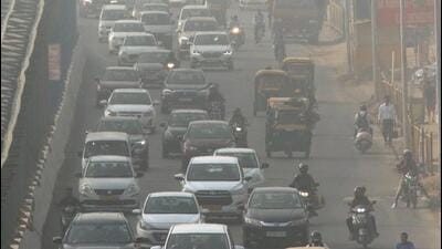 Gurugram: Vehicles ply on a road amid low visibility due to dense smog, in Gurugram, Monday, March 21, 2022. (PTI Photo) (PTI03_21_2022_000063B) (PTI)