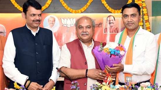 Union Minister Narendra Singh Tomar, BJP leader Devendra Fadnavis, Goa acting CM Pramod Sawant during a meeting in Panaji on Monday.&nbsp;(ANI photo)