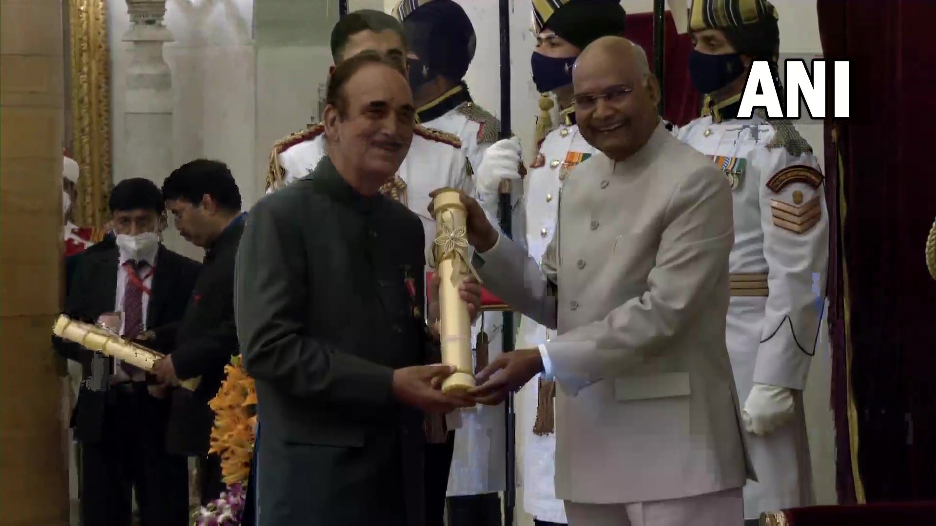 Senior Congress leader Ghulam Nabi Azad receives his Padma Bhushan award from President Ram Nath Kovind. (ANI)
