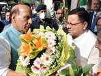 Dehradun, Mar 21 (ANI): Pushkar Singh Dhami felicitates Defence Minister Rajnath Singh on his arrival, in Dehradun on Monday. (ANI Photo)(ANI) Dehradun, Mar 21 (ANI): Pushkar Singh Dhami felicitates Defence Minister Rajnath Singh on his arrival, in Dehradun on Monday. (ANI Photo)(ANI)