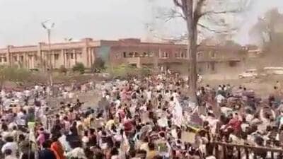 The video of the tribal protest in Sukma went viral on social media in which the police are seen trying to contain the protestors but the crowd managed to break through the main gate of the collectorate. (Video grab) The video of the tribal protest in Sukma went viral on social media in which the police are seen trying to contain the protestors but the crowd managed to break through the main gate of the collectorate. (Video grab)