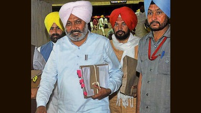 Punjab cabinet minister Harpal Cheema on the 3rd day of the assembly session in Chandigarh on Wednesday. The Punjab Appropriation (vote-on-account) Bill, 2022, was passed on the concluding day of the three-day session without any discussion. (Ravi Kumar/HT) Punjab cabinet minister Harpal Cheema on the 3rd day of the assembly session in Chandigarh on Wednesday. The Punjab Appropriation (vote-on-account) Bill, 2022, was passed on the concluding day of the three-day session without any discussion. (Ravi Kumar/HT)